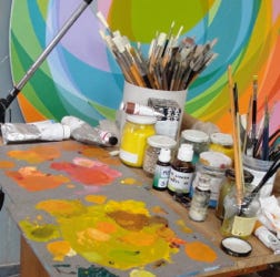 paleta con colores al óleo y rotomototondo